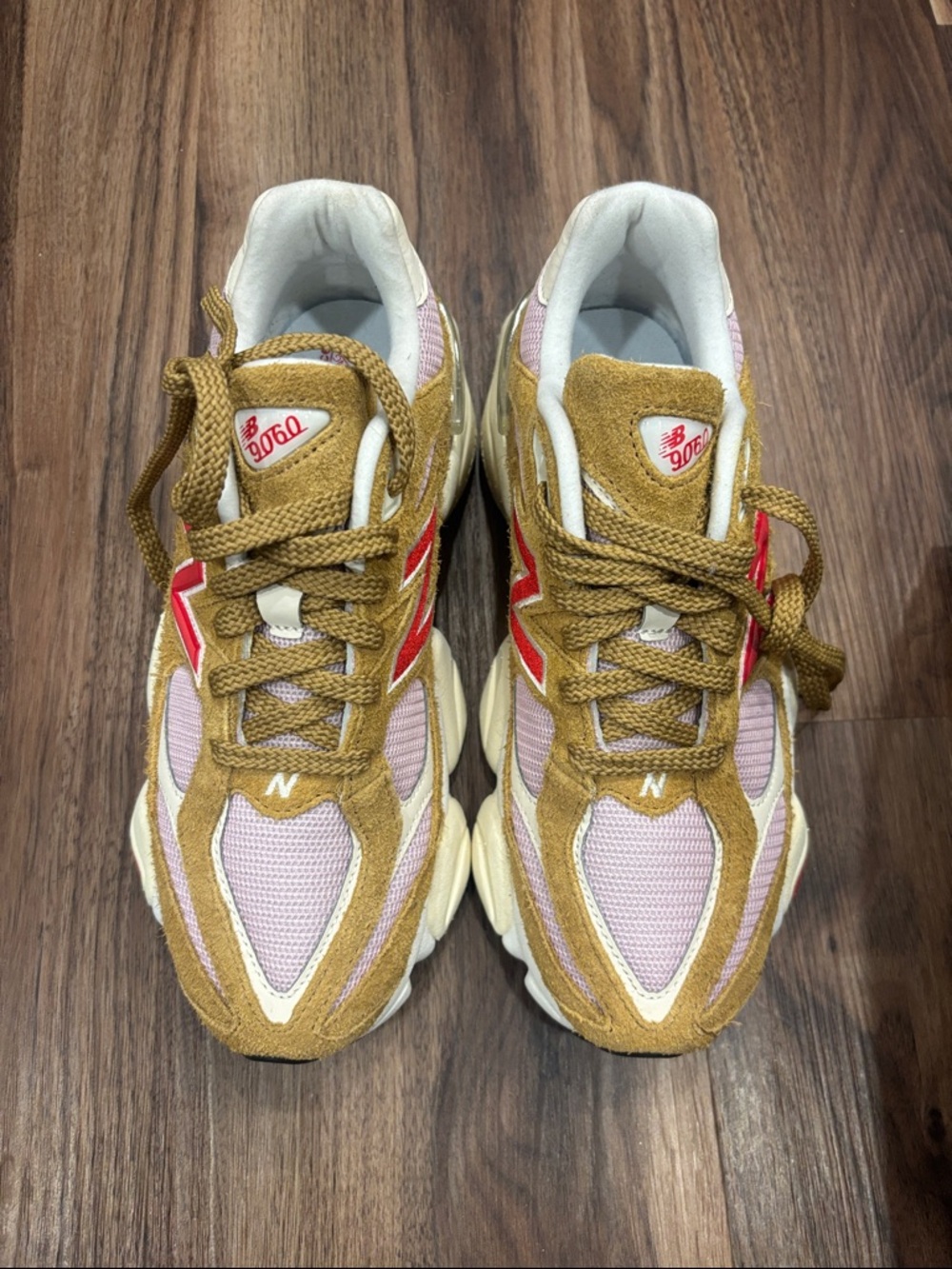 New Balance sneakers in pink, tan & red accents